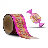 Rollo de Película Plástica Metalizada de Grado Alimenticio PET Retorcida con Impresión Personalizada al por Mayor de Alta Calidad para Envoltura de Chocolate/Dulces