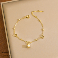 Nouveaux accessoires, bijoux exquis pour femmes, plaqué or 18 carats, acier inoxydable, pendentif cylindrique à fleurs creuses, bracelet réglable