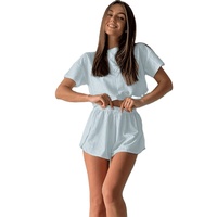 Ensemble deux pièces de vêtements de nuit pour femmes, style international, sexy, ajouré et respirant, avec haut à manches courtes et short fendu, pour la maison