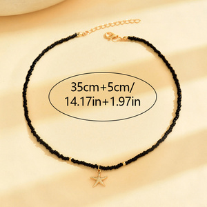 Nuova <span class=keywords><strong>Collana</strong></span> Girocollo Trendy <span class=keywords><strong>con</strong></span> <span class=keywords><strong>Perline</strong></span> <span class=keywords><strong>Nere</strong></span> <span class=keywords><strong>e</strong></span> Ciondolo a Stella Dorata, Gioiello Boho da Donna per Uso Quotidiano, Regalo - Product Image 2