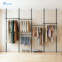 YIJIALE Vente en gros de présentoirs à vêtements minimalistes avec base en caoutchouc antidérapante pour la vente au détail commerciale