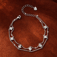 Bracelet tendance porte-bonheur élégant à double rangée de chaînes, style floral, avec pendentif trèfle à quatre feuilles en moissanite de 2,5 mm pour femme