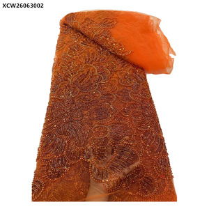 Tissu de dentelle de luxe avec perles de cristal, broderie orange brûlé, tulle africain et sequins perlés - Product Image 1