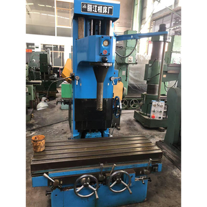 Máquina perforadora vertical de 3 ejes y 4 husillos de alta precisión para núcleos de motor, de uso medio, para industria pesada, de bajo consumo energético, usada. - Product Image 1