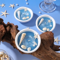 Bougie parfumée artisanale festive sur le thème de l'océan avec coquillages et étoiles de mer, bol en gypse, cire végétale, bougies originales pour fête sur la plage