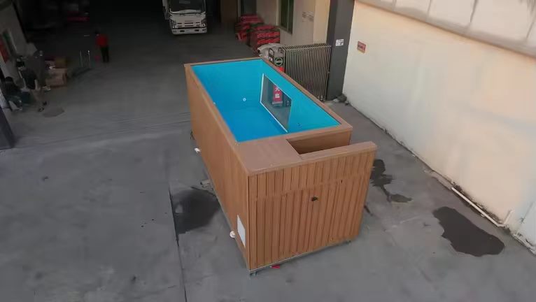 Small garden swimming pool with windows