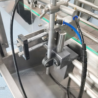 Guangzhou pour Sipuxin Machine de remplissage automatique de liquides par le haut, machine de remplissage de liquides chauds, de cire de bougie et de gelée de pétrole