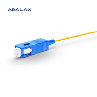 Pigtail Optik Single Mode High-Performance SC/UPC 9/125m 0.9mm LSZH Kuning Simplex Tight-Buffered dengan Kehilangan Penyisipan Rendah untuk FTTX/Data