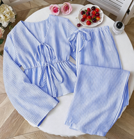 Nouvel ensemble décontracté deux pièces confortable et haut de gamme à rayures, avec haut ample à lacets, polyvalent, à manches longues, élégant et tendance