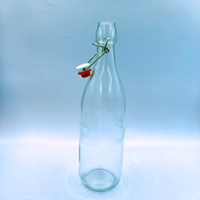 Botella de Vidrio Transparente Redonda de 1000 ml, 500 g, 1 L, Juego Completo a Precio Económico, con Tapa Abatible y Tapón Metálico