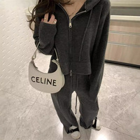 Vente en gros de pulls à capuche et fermeture éclair à manches longues de couleur unie pour l'automne et l'hiver ensembles deux pièces cardigan et pantalons longs en tricot pour femmes