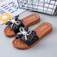 Nouvelles sandales d'été à nœud en PVC à semelle épaisse, tongs décontractées et tendance pour femme