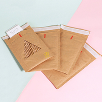Enveloppe postale écologique en papier rembourré Emballage kraft en nid d'abeille Sac postal express