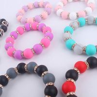 Porte-clés en perles de silicone Porte-clés bracelet élastique Porte-clés en cuir avec pompon Dragonne Bijoux Porte-clés en silicone