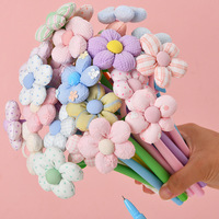 Nouveau stylo gel neutre créatif en forme de fleur, mignon et coloré, mini-fleur très stylée, stylo de signature à secouer et à presser, 0,5 mm, en plastique