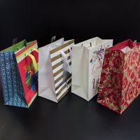 Sacs en papier SP1729 avec étiquettes cadeaux, sacs cadeaux en vrac pour fête prénuptiale avec poignées, sacs fourre-tout pour les fêtes de Noël, mariages et autres événements.