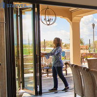 Porte de terrasse pliante en aluminium avec double vitrage trempé, pour véranda, design extérieur, étanche et résistant aux intempéries, système d'étanchéité