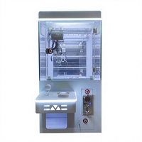Mini machine à griffes mignonne rose avec lumière LED néon, attrape-jeu en peluche Kawaii, jeu d'arcade à monnayeur, design compact, vente en gros usine
