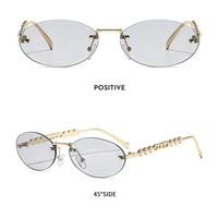 Lunettes de soleil ovales sans monture pour femme, protection UV400, branches en métal incrustées de perles, verres découpés en forme de chaîne, idéales pour les fêtes et la plage