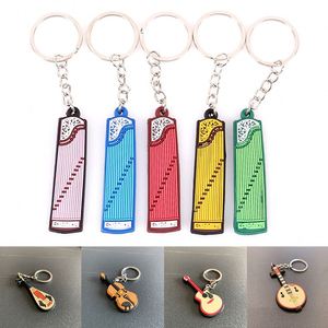10 Llaveros de Instrumentos Musicales: Guitarra, Ukelele, Piano, Violín - Colgante Vintage para Llaves de Coche y Decoración - Product Image 5