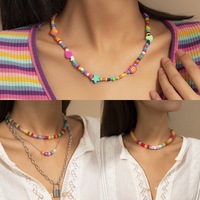 Collier de perles de riz colorées perlées à la main en gros mixte Style ethnique collier en acrylique poterie douce irrégulière pour les femmes