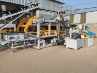 Machine automatique de fabrication de briques QT10-15 pour la production de blocs creux en béton, de briques pleines et de dalles de pavage colorées emboîtables