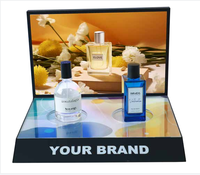 Support d'affichage de parfum en acrylique personnalisé YIJIAO, étagère à parfum LED pour vitrine de magasin de détail
