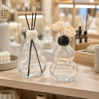Bouteilles diffuseurs en verre en forme de gourde avec bâtonnets noirs et décorations florales Sola – Bouteille vide pour aromathérapie, idéale pour parfumer la maison ou comme cadeau
