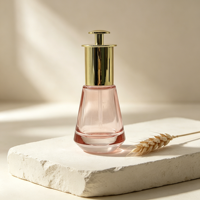 Flacon d'essence en verre rose trapézoïdal à fond épais de 30 ml, pompe compte-gouttes plaquée or, emballage de luxe pour sérum réparateur de soins de la peau