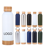 Bouteille d'eau sport portable double paroi isotherme de haute qualité avec fond en bambou, couvercle en bambou et poignée – Vente en gros