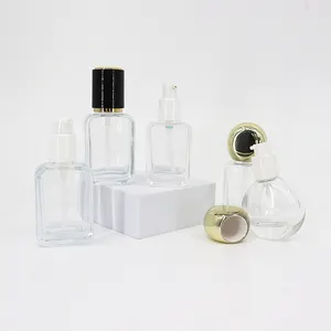 30ml 50ml Bouteille de pulvérisation de lotion en verre à émulsion de parfum transparente de forme unique avec pulvérisateur doré noir blanc