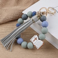 Porte-clés bracelet en perles de silicone avec pompon en cuir PU, breloque croix biblique, pendentif pour sac à main femme