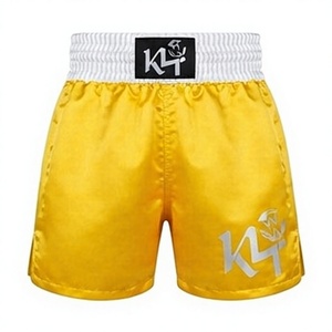 Shorts de MMA unisexe K4 jaunes coupe ample en polyester/coton avec logo frontal imprimé par sublimation - Product Image 1