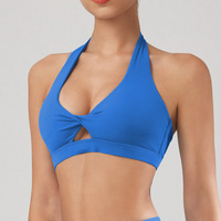 Soutien-gorge de sport respirant à séchage rapide, col en V torsadé, maintien moyen, dos ouvert, ourlet large, rembourrage amovible, idéal pour le yoga et la gym