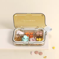 Boîte de rangement pour pilules quotidienne, portable, étanche, en silicone et plastique ABS, avec 4 compartiments, pour médicaments et vitamines