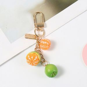 Accessoires de pendentif porte-clés en résine, motif fruit de mandarine, style dessin animé pastoral, mignons et simples, pour sacs d'école, téléphones et écouteurs - Product Image 5