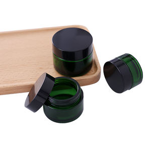 Tarros de Crema Cosmética de Vidrio Verde de 50g 100g con Logotipo Personalizado, Tapa Negra, Impresión Serigráfica para Crema Facial y Cuidado de la Piel - Product Image 1