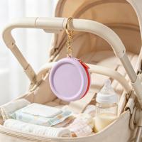 Pochette de maquillage circulaire en silicone, sac de rangement pour écouteurs, rouge à lèvres, câble de données, sac portable à fermeture éclair avec porte-clés
