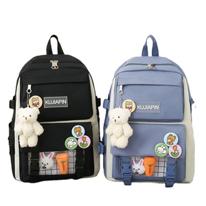 2023 nuevo lindo colgante mochila femenina dibujos animados estudiante mochila de gran capacidad impermeable chica mochila conjunto al por mayor - Product Image 1