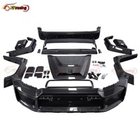 Kit de mise à niveau R Style en fibre de carbone sèche avec pare-chocs, spoiler et capot pour Mercedes Classe G G63 W465 AMG G550 G500 2025 2026