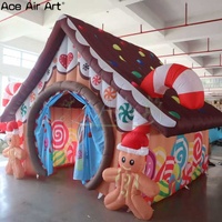 Maison de Noël géante gonflable avec décorations de canne à sucre, maison gonflable de vacances pour la cour extérieure, les événements et les fêtes.
