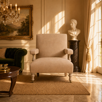 Fauteuil en cuir haut de gamme, confortable, avec dossier incliné et accoudoirs rembourrés, idéal pour suite d'hôtel de luxe