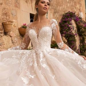 Nuovi Arrivi: Abiti da Sposa con Collo Trasparente, Maniche Lunghe in Pizzo, Abiti Nuziali Personalizzati per il Medio Oriente, Vestito da Sposa da Spiaggia - Product Image 2