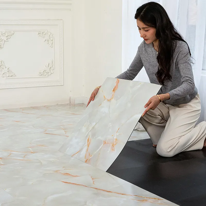 Pavimenti in laminato lucido pietra plastica composita piastrelle di marmo lucido Design autoadesivo pavimenti LVT pavimenti in vinile impermeabile