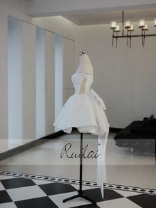 <span class=keywords><strong>Robe</strong></span> de mariée <span class=keywords><strong>civile</strong></span> courte en satin basque avec un grand nœud amovible et détachable, épaules dénudées, Ruolai QD06398 - Product Image 6