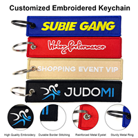 Geborduurde sleutelhangers met aangepast merklogo, bulkverpakking voor vliegtuigvlaggen, jet tags, accessoires & geweven stoffen label sleutelringen