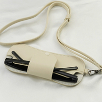 Nouveau sac de rangement pour lunettes de cou suspendu en cuir PU créatif étui anti-perte portable pour les lunettes de soleil de protection solaire de plage
