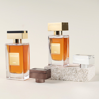 Vente en gros de flacons de parfum vides de luxe en verre, forme carrée plate, avec bouchon doré-noir
