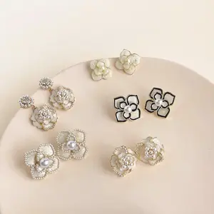 Pure Desire Wind Drop Oil Camellia Earrings Female Sweet Small Fragrant Wind Pearl Earrings Senior Sense Earrings Wholesale