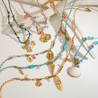Collier en acier inoxydable plaqué or 18 carats, anti-ternissement, avec breloques coquille de crabe, étoile de mer, poisson, hippocampe, bijoux d'été style Mermaidcore